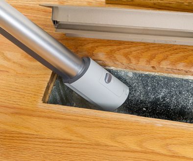 Cleaning Inside Heating Floor Vent With Vacuum Cleaner